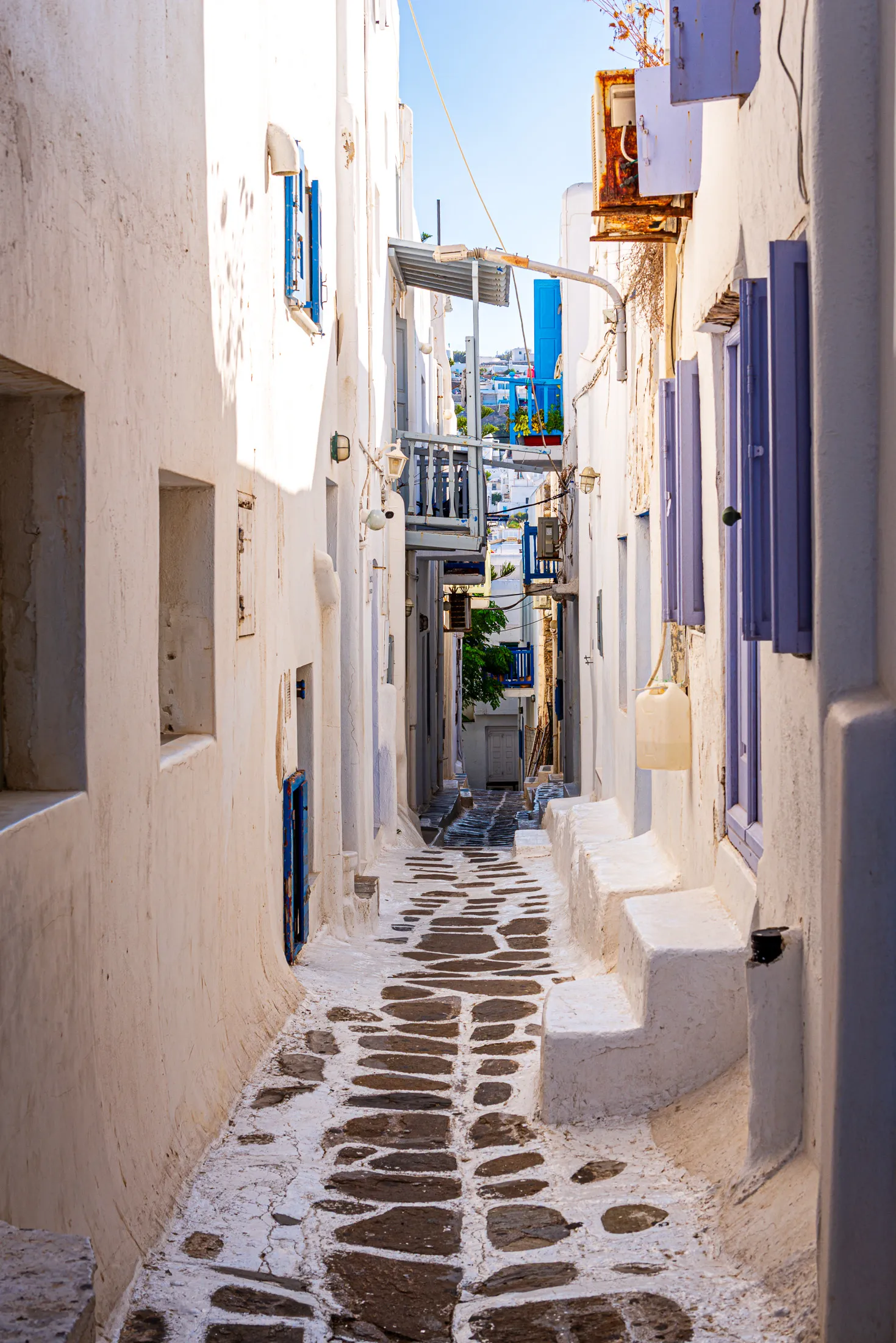 Mykonos white washed alley.LS8mK2bF