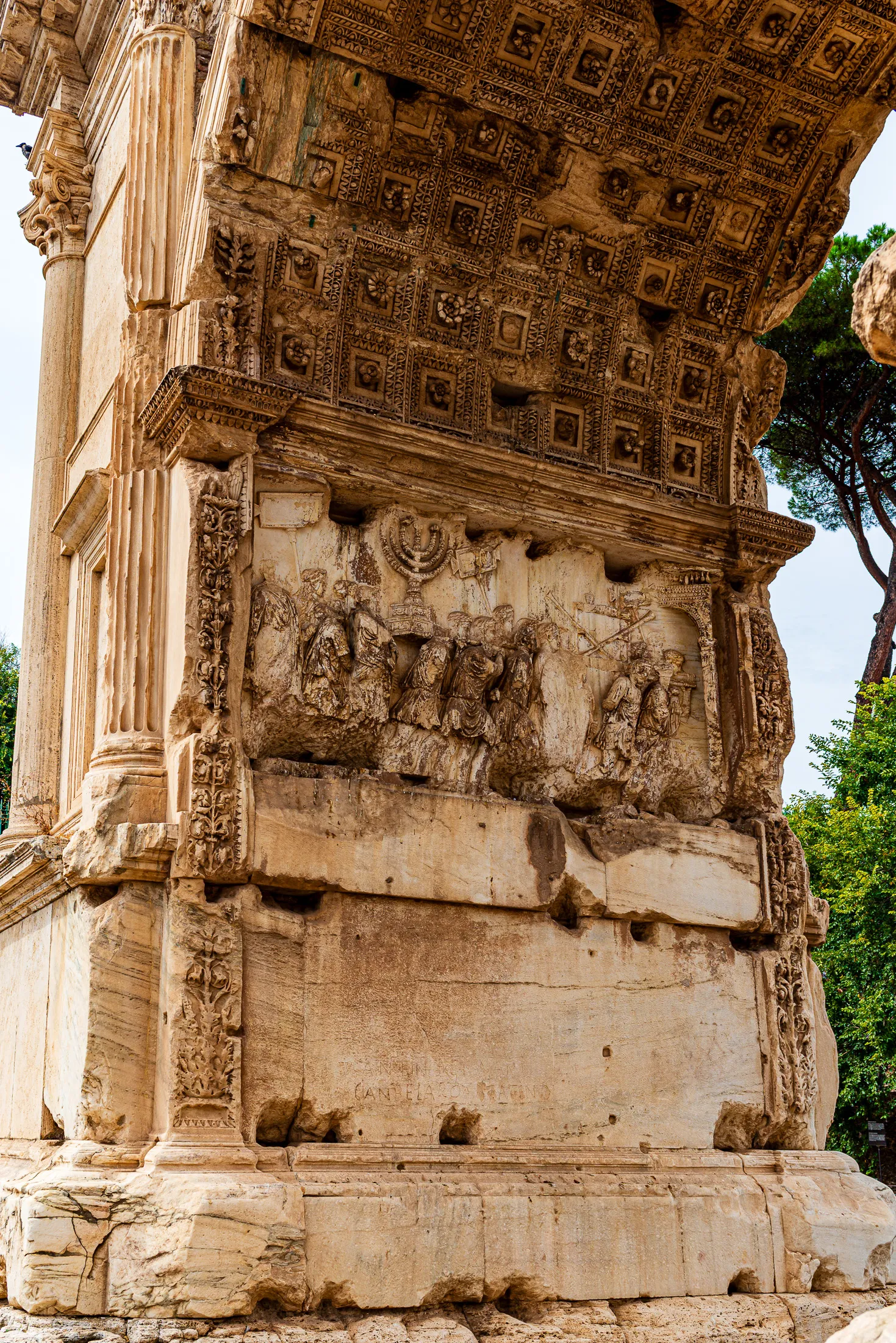 Detailed stone carving of the Jerusalem spoils panel relief inside the Arch of Titus